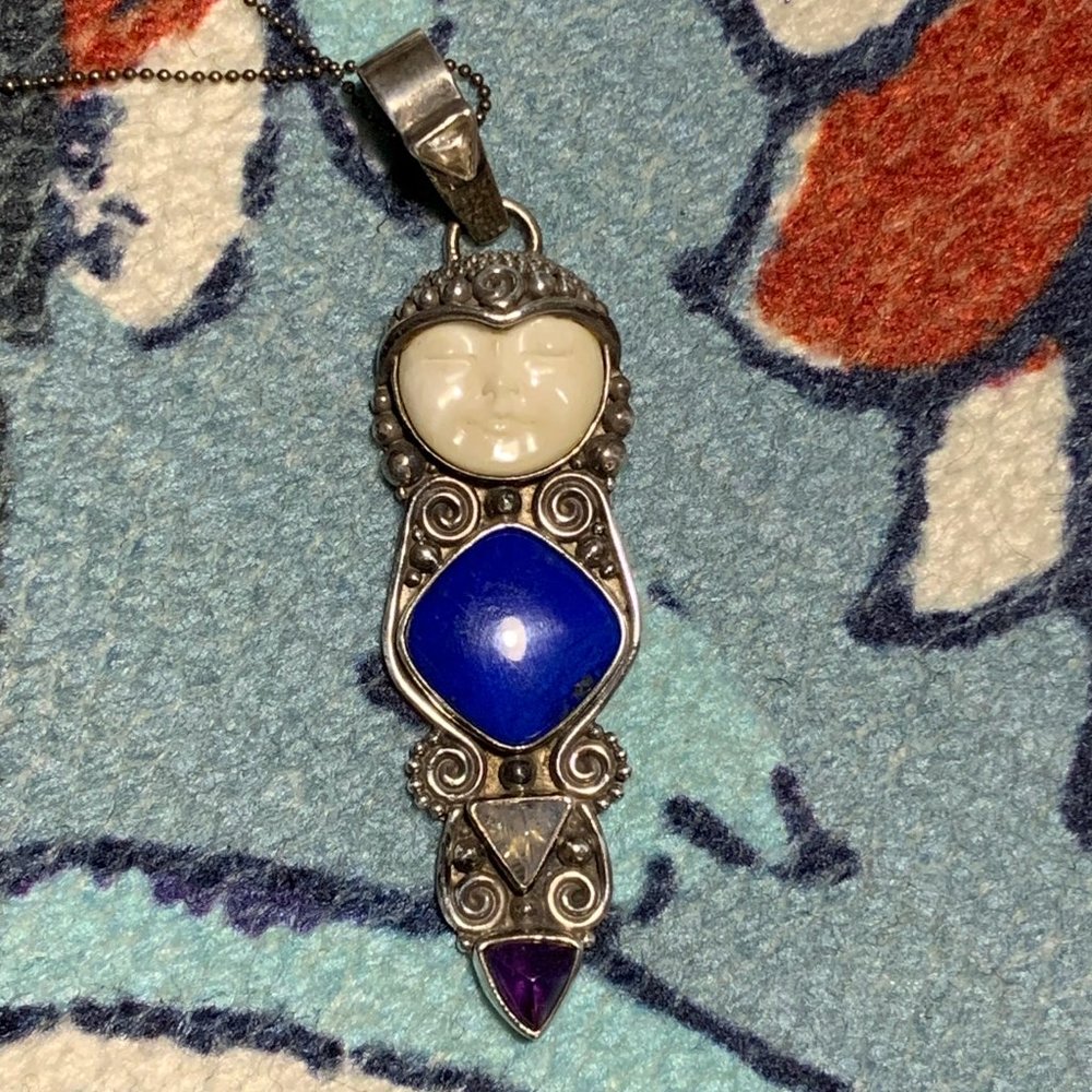 Beautiful genuine silver caved moon face pendant